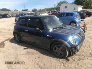 2003 MINI Hardtop S z VIN WMWRE33403TD67833, wystawiony jako IAAI lot #42065519 z przebiegiem 228 196 mil mil oraz . Historia ofert i sprzedaży dostępna na DreamBid. Obrazek 1.