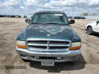 2001 Dodge Dakota z VIN 1B7HG2AX81S320355, wystawiony jako Copart lot #55410715 z przebiegiem 164 931 mil mil oraz Szkoda całkowita • Salvage title. Historia ofert i sprzedaży dostępna na DreamBid. Obrazek 5.