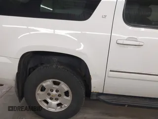 2013 Chevrolet Suburban LT with VIN 1GNSKJE74DR145680, listed as a IAAI auction lot 42114209 with 178,052 mi miles. Bid and sale history available at carsss.com. Image 6.
