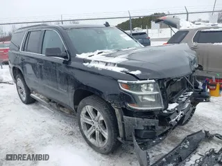 2016 Chevrolet Tahoe LT with VIN 1GNSKBKC5GR413972, listed as a IAAI auction lot 41559646 with 141,708 mi miles. Bid and sale history available at carsss.com. Image 1.
