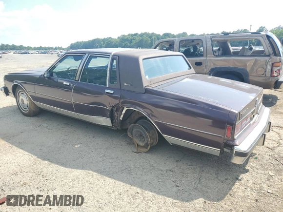 1987 Chevrolet Caprice z VIN 1G1BU51H7H9156079, wystawiony jako Copart lot #60443124 z przebiegiem 44 452 mil mil oraz Szkoda całkowita • Salvage title. Historia ofert i sprzedaży dostępna na DreamBid. Obrazek 2.