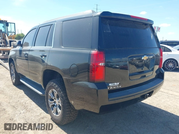 2020 Chevrolet Tahoe LS with VIN 1GNSCAKC4LR293082, listed as a IAAI auction lot 42663985 with 143,114 mi miles and . Bid and sale history available at DreamBid. Image 3.