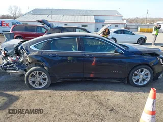2014 Chevrolet Impala LT with VIN 2G1125S3XE9315199, listed as a IAAI auction lot 41824899 with 235,368 mi miles and . Bid and sale history available at DreamBid. Image 13.