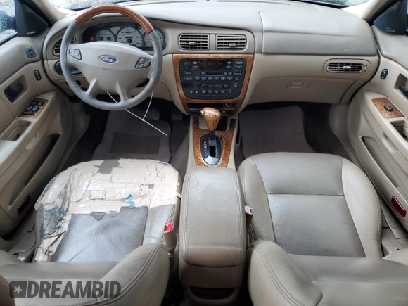 2003 Ford Taurus SEL Deluxe with VIN 1FAHP56S83A225002, listed as a Copart auction lot 49456975 with 199,759 mi miles and Salvage Title. Bid and sale history available at DreamBid. Image 8.