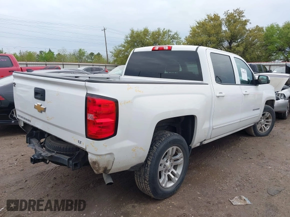 2017 Chevrolet Silverado 1500 LT with VIN 3GCPCREC7HG212382, listed as a IAAI auction lot 41896791 with 129,264 mi miles. Bid and sale history available at carsss.com. Image 4.