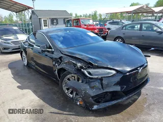 2017 Tesla Model S 60 with VIN 5YJSA1E13HF228486, listed as a IAAI auction lot 42092686 with 78,089 mi miles and . Bid and sale history available at DreamBid. Image 1.
