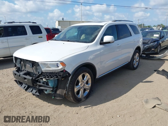 2014 Dodge Durango Limited with VIN 1C4RDJDGXEC323129, listed as a IAAI auction lot 42318727 with 148,451 mi miles and . Bid and sale history available at DreamBid. Image 2.