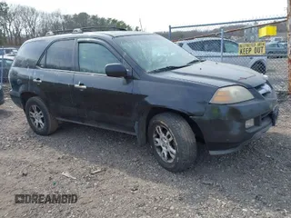 2004 Acura MDX Touring Pkg with VIN 2HNYD18604H507613, listed as a IAAI auction lot 41789423 with 999,999 mi miles. Bid and sale history available at carsss.com. Image 1.