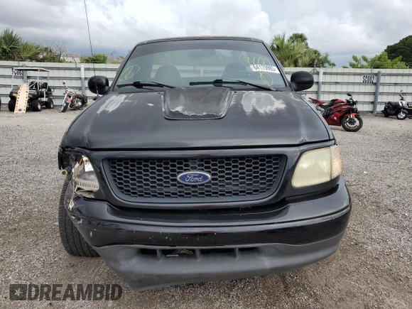 2003 Ford F-150 XL with VIN 1FTRF07W33KB56591, listed as a Copart auction lot 64170993 with 150,941 mi miles and Salvage title. Bid and sale history available at DreamBid. Image 5.