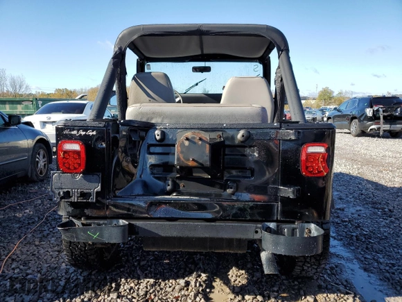 1989 Jeep Wrangler "S" with VIN 2J4FY19E9KJ162797, listed as a Copart auction lot 81404894 with 137,051 mi miles and Clean Title. Bid and sale history available at carsss.com. Image 6.