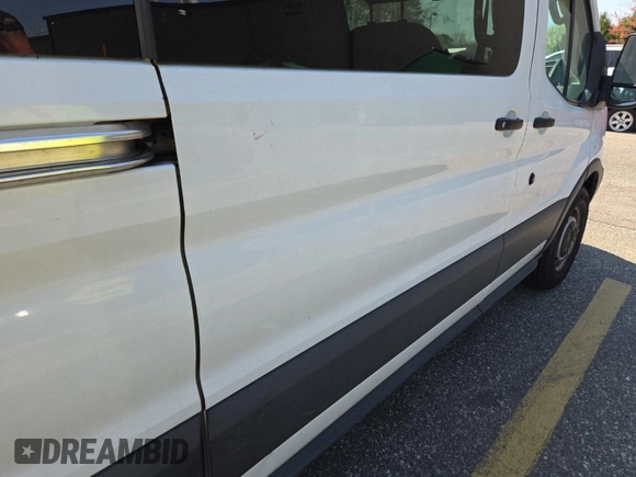 2015 Ford Transit XL with VIN 1FBZX2YM7FKA42480, listed as a IAAI auction lot 42260329 with 250,679 mi miles and . Bid and sale history available at DreamBid. Image 29.