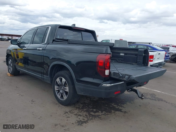 2017 Honda Ridgeline RTL-E with VIN 5FPYK3F7XHB030565, listed as a IAAI auction lot 41795386 with 79,252 mi miles. Bid and sale history available at carsss.com. Image 3.