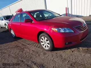 2007 Toyota Camry CE with VIN 4T1BE46K67U010279, listed as a IAAI auction lot 41504065 with 297,916 mi miles. Bid and sale history available at carsss.com. Image 1.