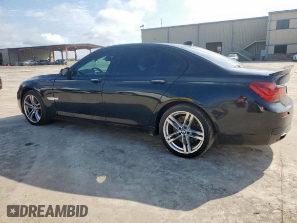 2014 BMW 7 Series 750i с VIN WBAYA8C57ED824970, выставлен на аукционе Copart как лот 61005925 с пробегом 144 457 миль миль и Чистый • Clean title. История ставок и продаж доступна на DreamBid. Изображение 2.