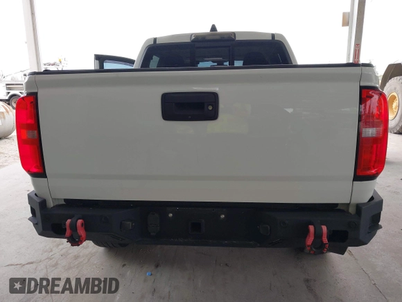 2020 Chevrolet Colorado 2WD Z71 with VIN 1GCGSDEN2L1159458, listed as a IAAI auction lot 42412924 with 90,011 mi miles and . Bid and sale history available at DreamBid. Image 17.