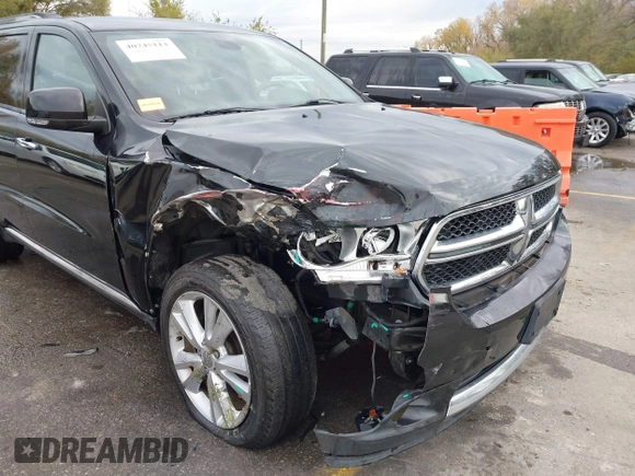 2013 Dodge Durango Crew with VIN 1C4RDHDG8DC592706, listed as a IAAI auction lot 40745114 with 95,757 mi miles and . Bid and sale history available at DreamBid. Image 6.