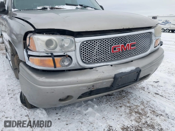 2001 GMC Yukon Denali z VIN 1GKEK63U21J222783, wystawiony jako IAAI lot #41443565 z przebiegiem Nie podano mil oraz . Historia ofert i sprzedaży dostępna na DreamBid. Obrazek 6.