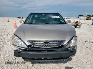 2004 Toyota Camry LE with VIN 4T1BE32K14U329066, listed as a Copart auction lot 60711515 with 178,144 mi miles and Salvage title. Bid and sale history available at DreamBid. Image 11.