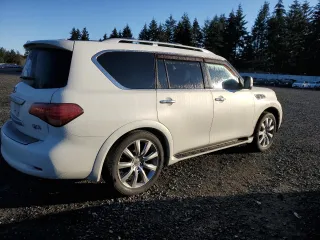 2012 Infiniti QX56 7-passenger with VIN JN8AZ2NE1C9021857, listed as a Copart auction lot 76967164 with 153,958 mi miles and Salvage Title. Bid and sale history available at carsss.com. Image 3.