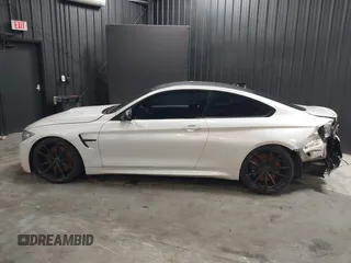 2017 BMW M4 with VIN WBS3R9C5XHK709445, listed as a IAAI auction lot 39303430 with 59,095 mi miles. Bid and sale history available at carsss.com. Image 15.