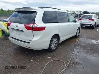 2015 Toyota Sienna XLE with VIN 5TDYK3DC3FS529256, listed as a IAAI auction lot 42172570 with 163,725 mi miles and . Bid and sale history available at carsss.com. Image 4.