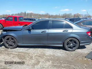 2009 Mercedes-Benz C-Class 3.5L Sport with VIN WDDGF56X79R048947, listed as a IAAI auction lot 41995635 with 141,831 mi miles. Bid and sale history available at carsss.com. Image 14.