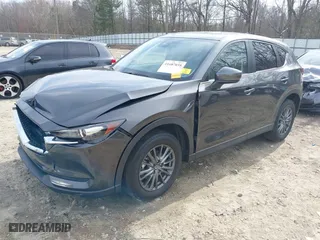 2017 Mazda CX-5 Touring with VIN JM3KFACLXH0125819, listed as a IAAI auction lot 41687038 with 101,769 mi miles. Bid and sale history available at carsss.com. Image 18.