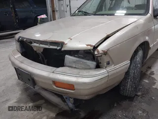 1991 Dodge Spirit z VIN 1B3XA46KXMF519542, wystawiony jako IAAI lot #42278204 z przebiegiem 134 919 mil mil oraz . Historia ofert i sprzedaży dostępna na DreamBid. Obrazek 6.