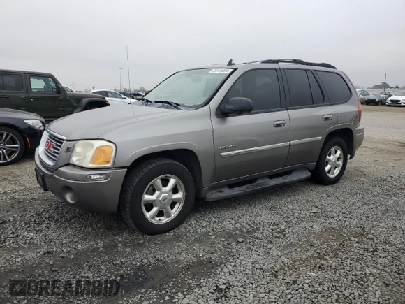 2006 GMC Envoy SLT with VIN 1GKDS13S962138197, listed as a Copart auction lot 85679094 with 166,376 mi miles and Salvage Title. Bid and sale history available at carsss.com. Image 1.