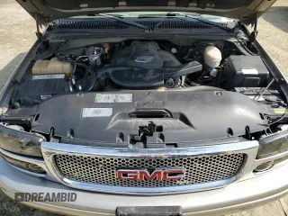 2003 GMC Sierra Denali z VIN 2GTFK69U831201215, wystawiony jako Copart lot #73801184 z przebiegiem 186 959 mil mil oraz Szkody całkowita. Historia ofert i sprzedaży dostępna na DreamBid. Obrazek 11.
