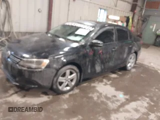 2012 Volkswagen Jetta TDI with VIN 3VWLL7AJXCM031579, listed as a IAAI auction lot 41227325 with 123,273 mi miles and . Bid and sale history available at DreamBid. Image 2.