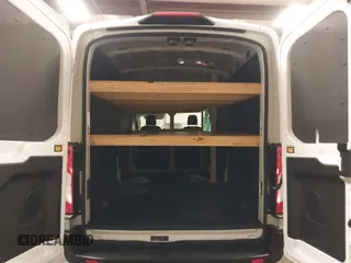 2024 Ford Transit Cargo with VIN 1FTBR2C81RKA01686, listed as a IAAI auction lot 41100566 with 74,842 mi miles and . Bid and sale history available at DreamBid. Image 17.