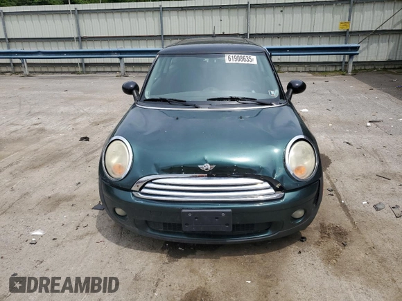 2007 MINI Hardtop with VIN WMWMF33537TL77985, listed as a Copart auction lot 61908635 with 180,470 mi miles and Salvage title. Bid and sale history available at DreamBid. Image 5.