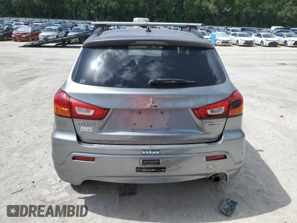 2011 Mitsubishi Outlander SE z VIN JA4AR4AU1BZ011732, wystawiony jako Copart lot #60986055 z przebiegiem Nie podano mil oraz Czysty tytuł • Clean title. Historia ofert i sprzedaży dostępna na DreamBid. Obrazek 6.