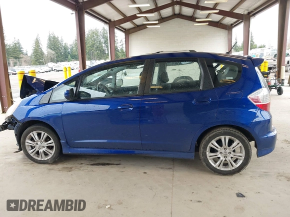 2009 Honda Fit Sport with VIN JHMGE88459C001743, listed as a IAAI auction lot 41852048 with 128,225 mi miles. Bid and sale history available at carsss.com. Image 15.