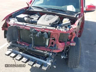 2021 Toyota Tacoma SR z VIN 5TFCZ5AN8MX247421, wystawiony jako IAAI lot #42147910 z przebiegiem 94 467 mil mil oraz . Historia ofert i sprzedaży dostępna na DreamBid. Obrazek 6.
