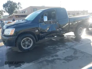 2004 Nissan Titan SE with VIN 1N6AA06A14N574940, listed as a IAAI auction lot 41821005 with 202,373 mi miles. Bid and sale history available at carsss.com. Image 2.