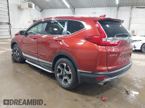 2017 Honda CR-V Touring with VIN 2HKRW2H95HH610401, listed as a IAAI auction lot 42177024 with 42,494 mi miles and . Bid and sale history available at carsss.com. Image 3.