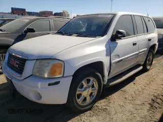 2002 GMC Envoy SLT with VIN 1GKDS13SX22184163, listed as a Copart auction lot 86400894 with 0 mi miles and Salvage Title. Bid and sale history available at carsss.com. Image 1.