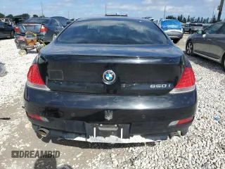 2007 BMW 6 Series 650i with VIN WBAEH13577CR52544, listed as a Copart auction lot 41953005 with 162,867 mi miles and Salvage Title. Bid and sale history available at carsss.com. Image 6.