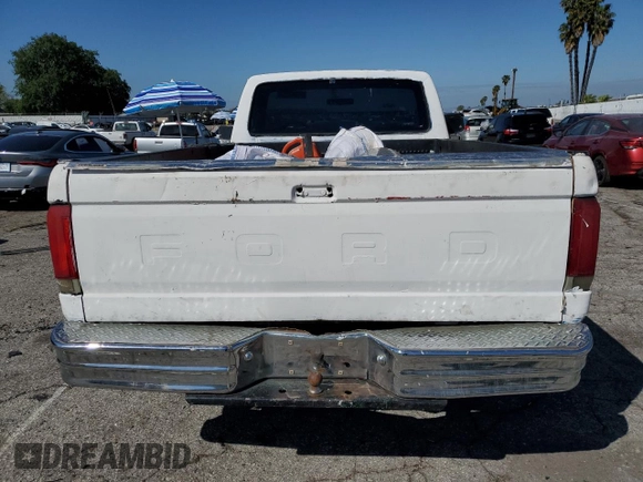 1989 Ford F-150 with VIN 1FTDF15Y6KKB77485, listed as a Copart auction lot 48943525 with 95,808 mi miles and Salvage Title. Bid and sale history available at carsss.com. Image 6.