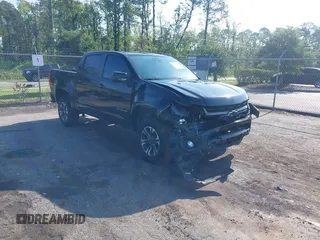 2021 Chevrolet Colorado 2WD Z71 z VIN 1GCGSDEN0M1129473, wystawiony jako IAAI lot #42540000 z przebiegiem 47 563 mil mil oraz . Historia ofert i sprzedaży dostępna na DreamBid. Obrazek 1.