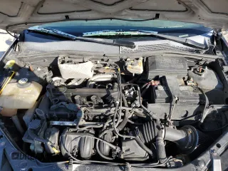 2007 Ford Focus S with VIN 1FAFP31N27W201266, listed as a Copart auction lot 51789625 with 211,274 mi miles and Salvage Title. Bid and sale history available at DreamBid. Image 11.