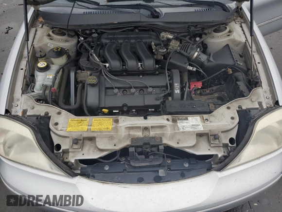 2001 Mercury Sable LS with VIN 1MEHM55S91A615364, listed as a Copart auction lot 73026454 with 85,273 mi miles and Salvage Title. Bid and sale history available at DreamBid. Image 11.