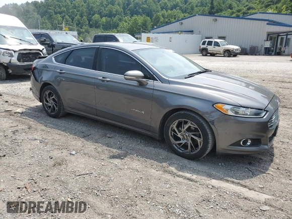 2014 Ford Fusion SE Hybrid with VIN 3FA6P0LU9ER289817, listed as a Copart auction lot 60909615 with 168,884 mi miles and Salvage title. Bid and sale history available at DreamBid. Image 4.