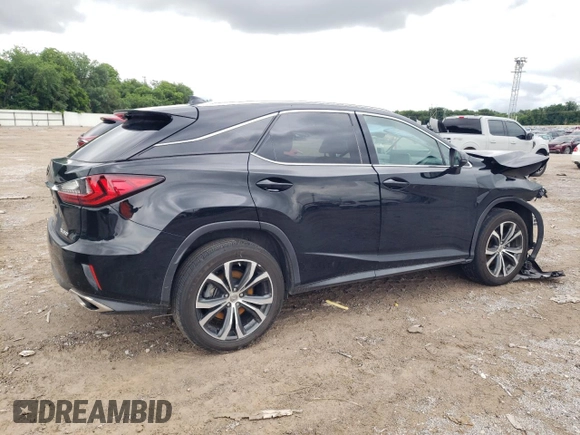 2016 Lexus RX 350 with VIN 2T2ZZMCAXGC010085, listed as a Copart auction lot 58309285 with 70,053 mi miles and Salvage title. Bid and sale history available at DreamBid. Image 3.