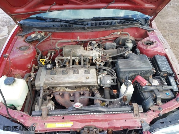 1997 Toyota Corolla with VIN 2T1BA02E9VC187458, listed as a IAAI auction lot 41441222 with 143,225 mi miles. Bid and sale history available at carsss.com. Image 10.