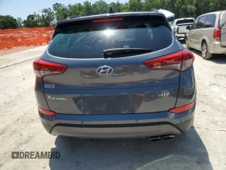 2016 Hyundai Tucson Limited with VIN KM8J33A22GU209297, listed as a Copart auction lot 54689985 with 108,674 mi miles and Salvage Title. Bid and sale history available at DreamBid. Image 6.