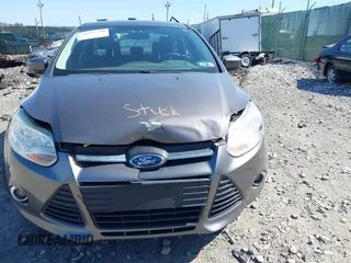 2012 Ford Focus SE with VIN 1FAHP3F27CL276208, listed as a IAAI auction lot 41995770 with 98,004 mi miles. Bid and sale history available at carsss.com. Image 16.