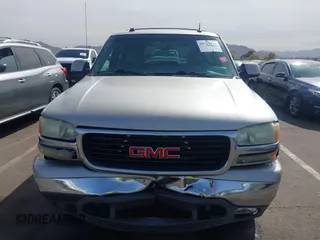 2004 GMC Yukon SLT with VIN 1GKEK13Z54R144181, listed as a IAAI auction lot 41702834 with 146,827 mi miles. Bid and sale history available at carsss.com. Image 12.